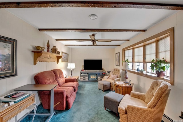 living room with carpet flooring, ceiling fan, a fireplace, a baseboard radiator, and beamed ceiling