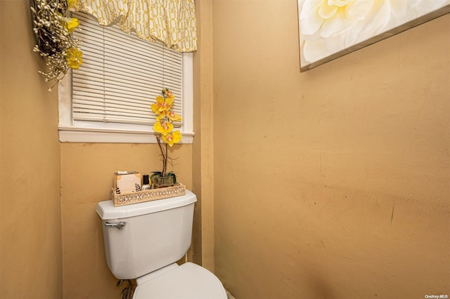 bathroom featuring toilet