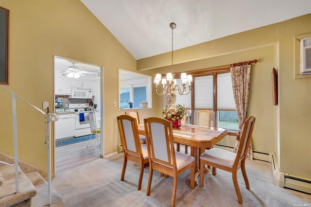 carpeted dining room with high vaulted ceiling and ceiling fan with notable chandelier