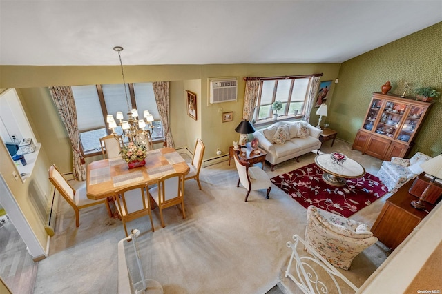 living room featuring light carpet, an inviting chandelier, an AC wall unit, vaulted ceiling, and a baseboard radiator