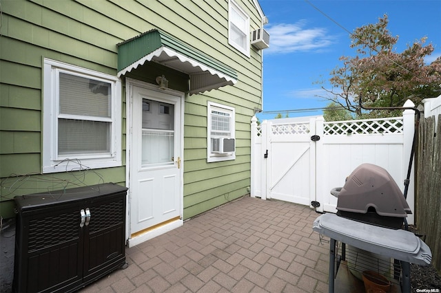 view of patio with a grill