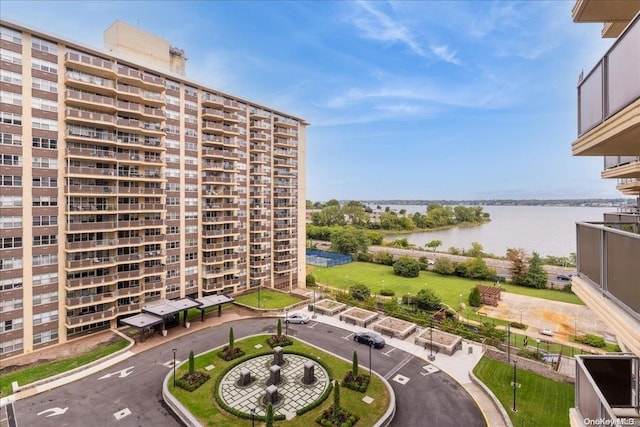 view of property with a water view