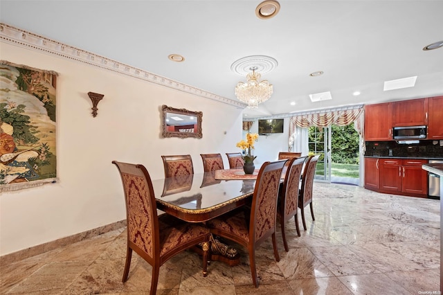 dining room with an inviting chandelier