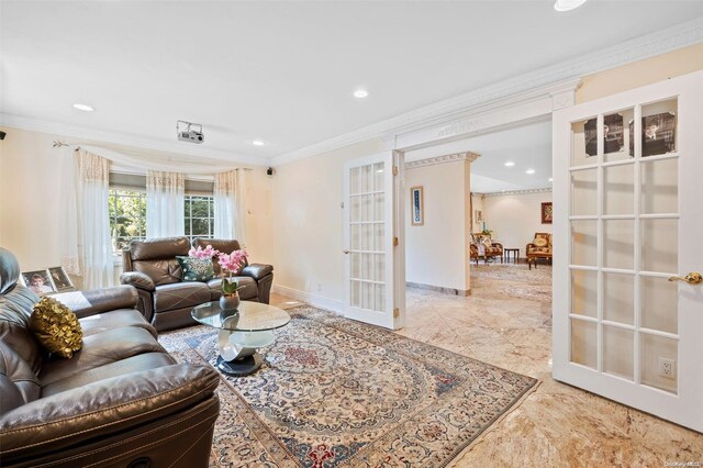 living room with crown molding and french doors