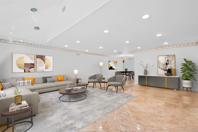 living room featuring lofted ceiling