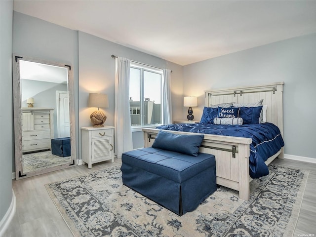 bedroom featuring light wood-type flooring