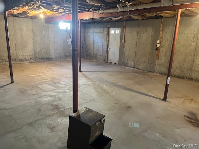 view of unfinished basement