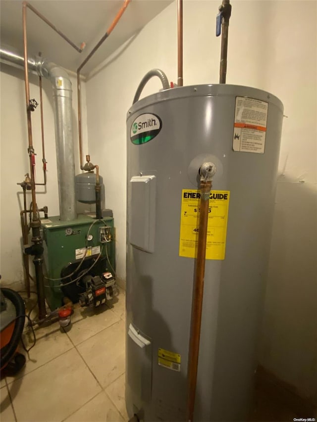 utility room featuring electric water heater