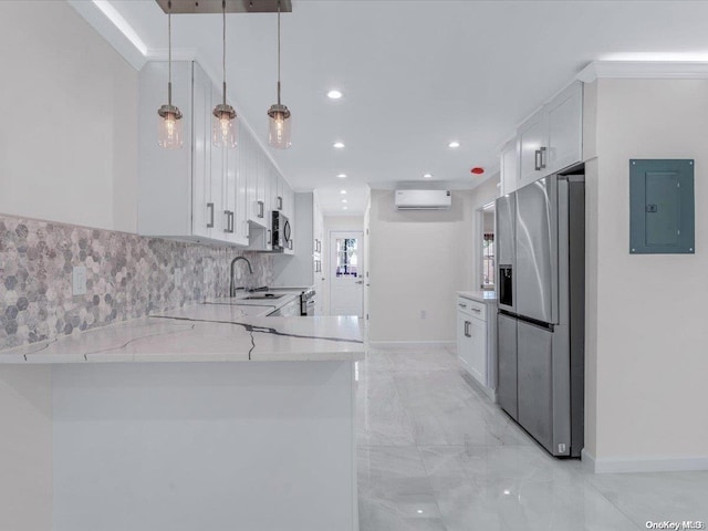 kitchen with stainless steel appliances, electric panel, kitchen peninsula, decorative light fixtures, and white cabinets