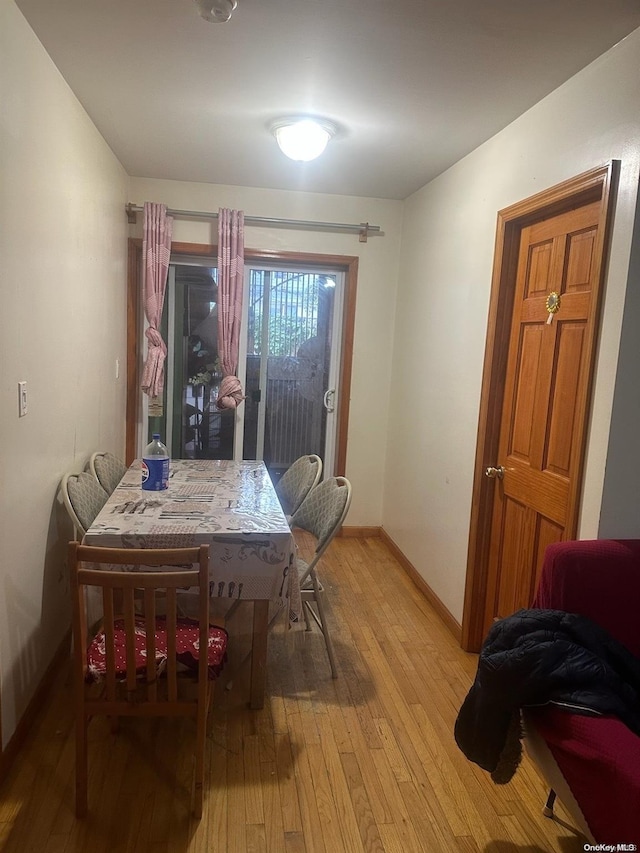 dining space featuring light hardwood / wood-style flooring