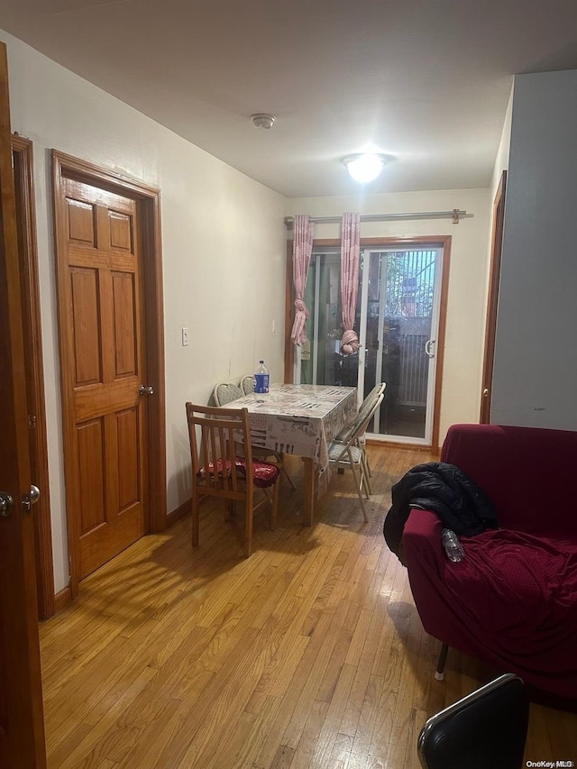 dining area with light hardwood / wood-style flooring