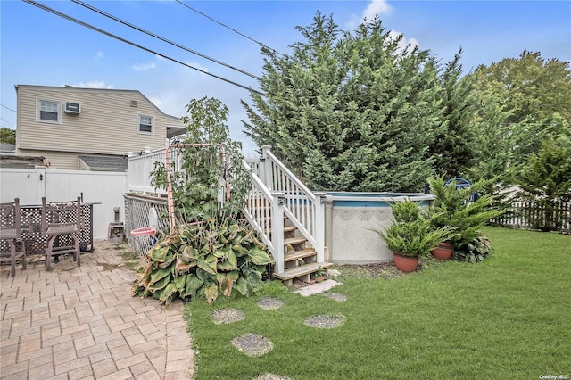 view of yard featuring a patio and a fenced in pool