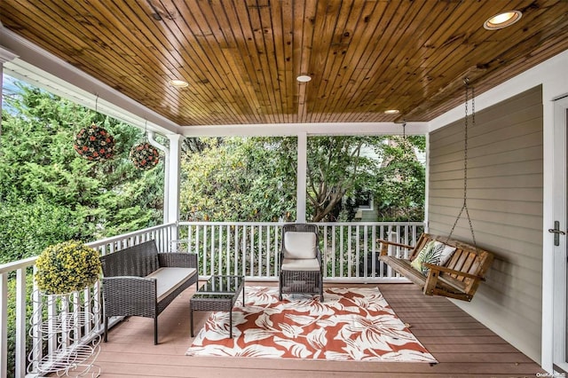9 N Bayles Ave, Port Washington, NY 11050 - wooden terrace with an outdoor hangout area
