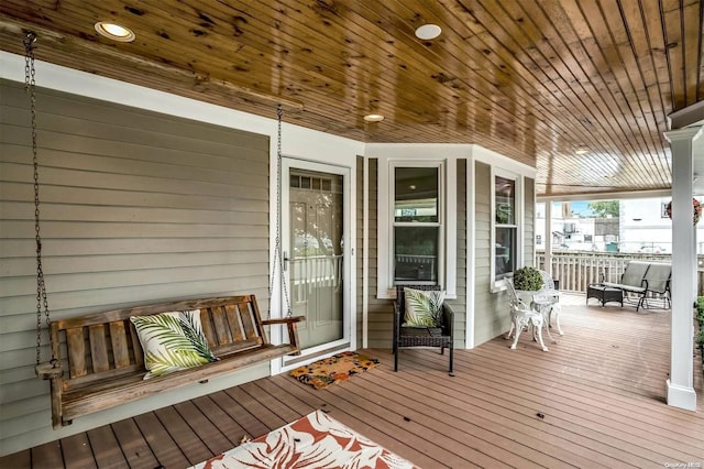 9 N Bayles Ave, Port Washington, NY 11050 - wooden terrace with covered porch