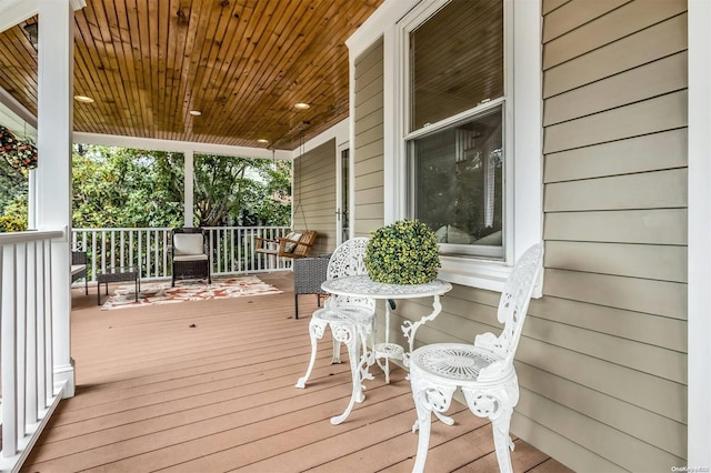 9 N Bayles Ave, Port Washington, NY 11050 - wooden terrace featuring a porch