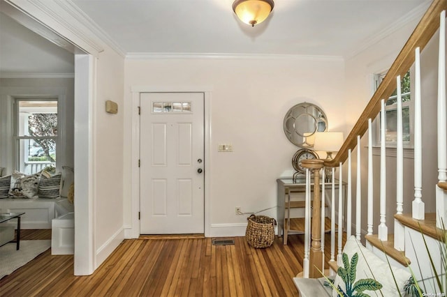 9 N Bayles Ave, Port Washington, NY 11050 - foyer featuring hardwood / wood-style floors and crown molding