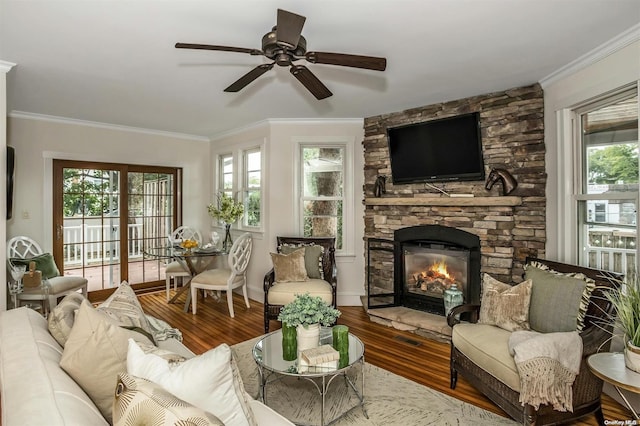 9 N Bayles Ave, Port Washington, NY 11050 - living room with a healthy amount of sunlight, wood-type flooring, and crown molding