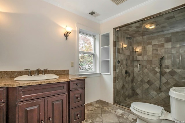 9 N Bayles Ave, Port Washington, NY 11050 - bathroom with tile patterned floors, walk in shower, vanity, crown molding, and toilet