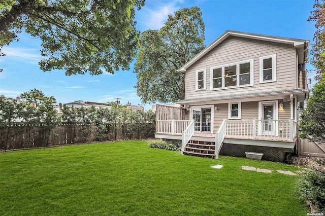 9 N Bayles Ave, Port Washington, NY 11050 - back of property featuring a yard and a wooden deck