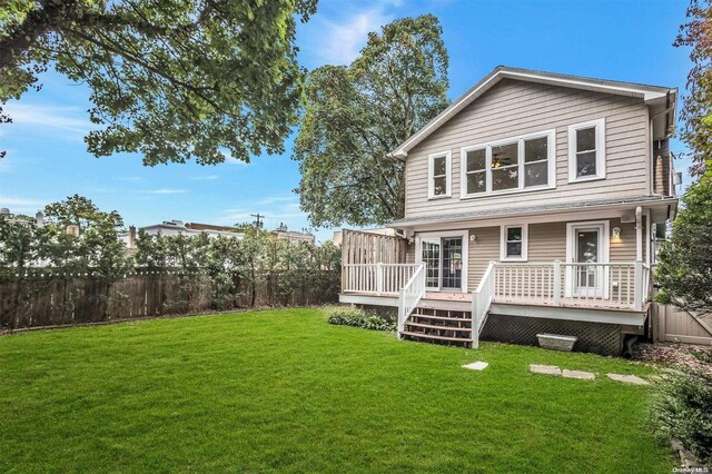9 N Bayles Ave, Port Washington, NY 11050 - back of house featuring a wooden deck