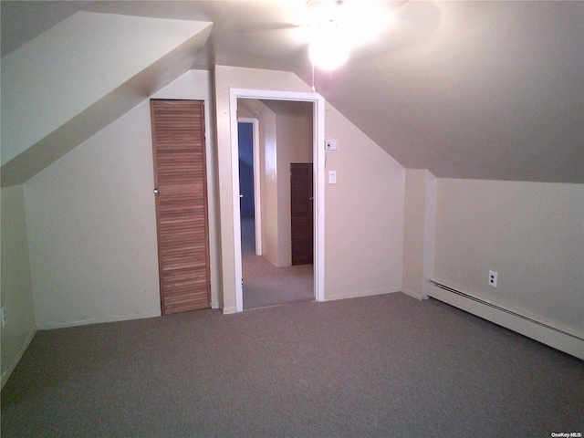 bonus room featuring a baseboard radiator, vaulted ceiling, and carpet floors