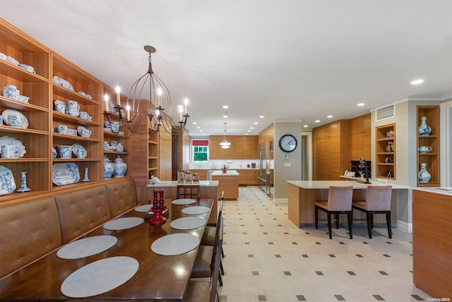 dining space featuring a notable chandelier