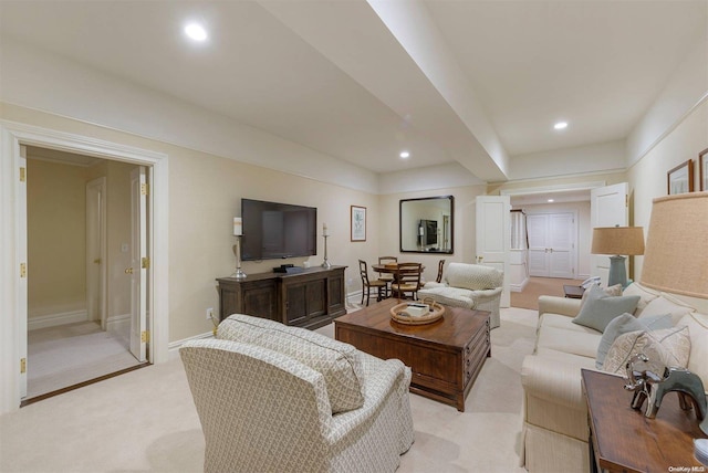 living room with light colored carpet