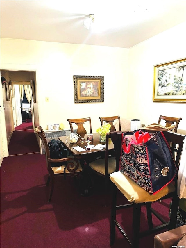 view of carpeted dining space