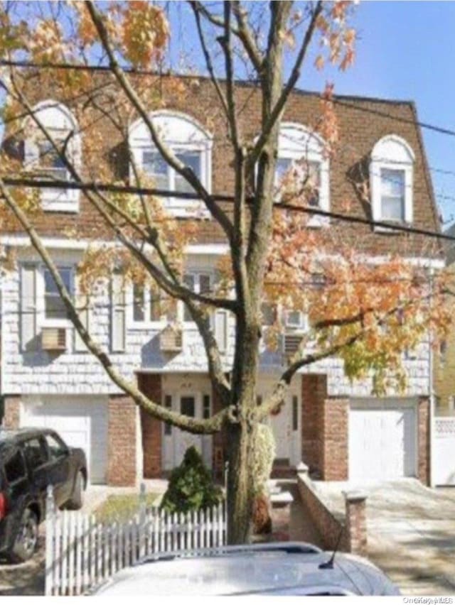 view of property featuring a garage