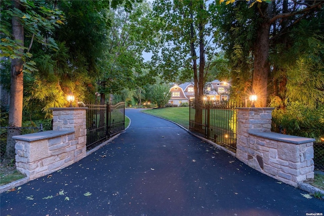 view of gate featuring fence