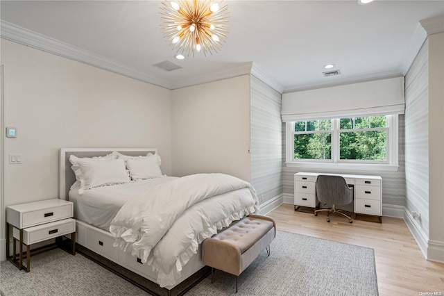 bedroom featuring wood finished floors, visible vents, baseboards, ornamental molding, and an inviting chandelier