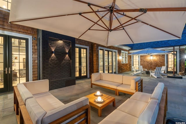 view of patio featuring outdoor lounge area and french doors