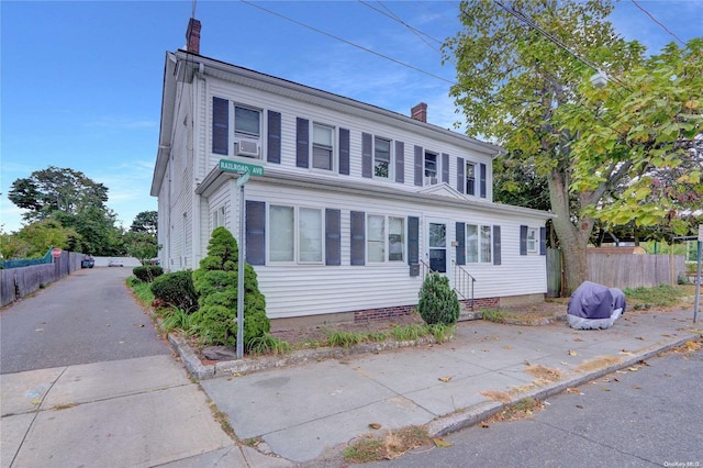 view of front of property featuring cooling unit