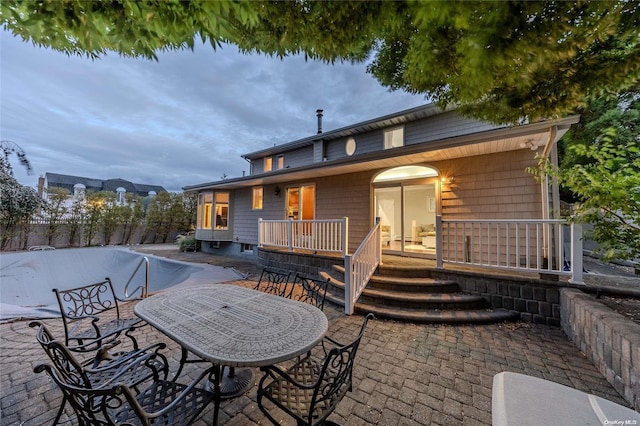 rear view of house with a patio area