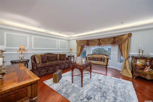 living room with dark hardwood / wood-style flooring