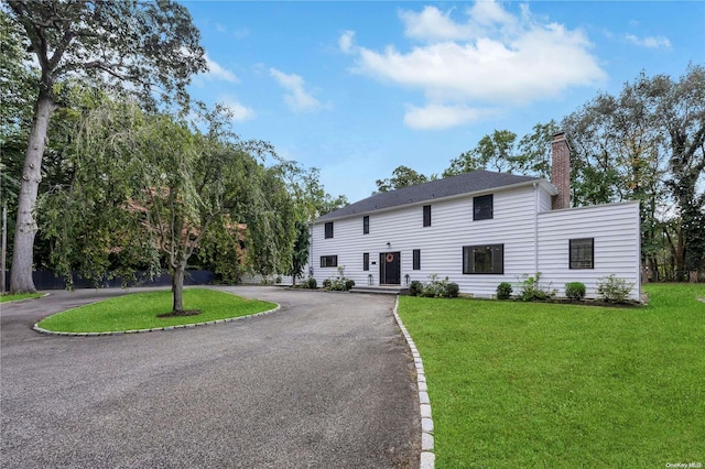 view of front of house with a front yard