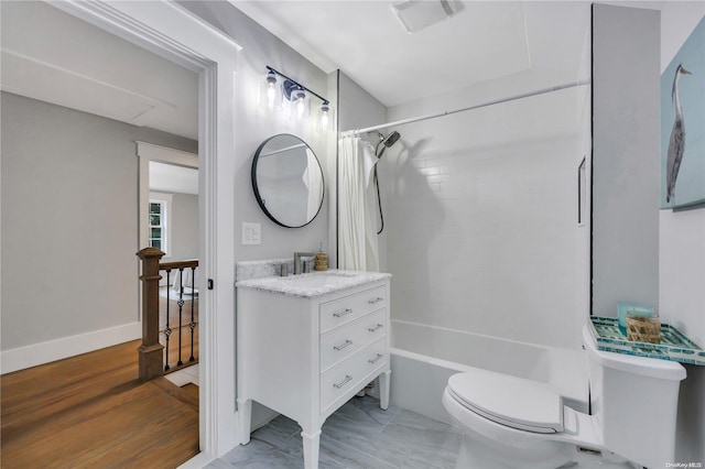 full bathroom with hardwood / wood-style floors, vanity, toilet, and shower / bathtub combination with curtain