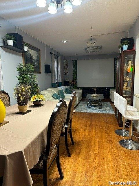 dining area with hardwood / wood-style floors