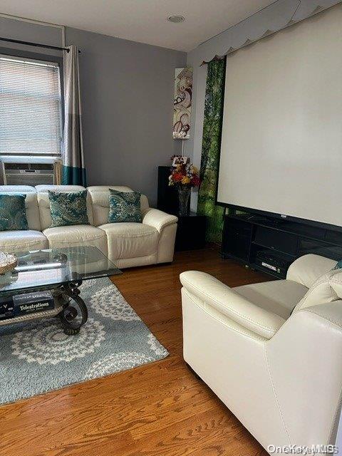 living room with wood-type flooring