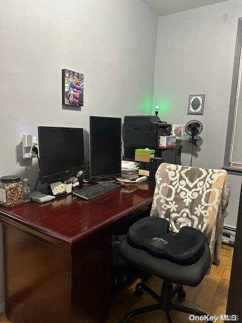 home office featuring parquet flooring