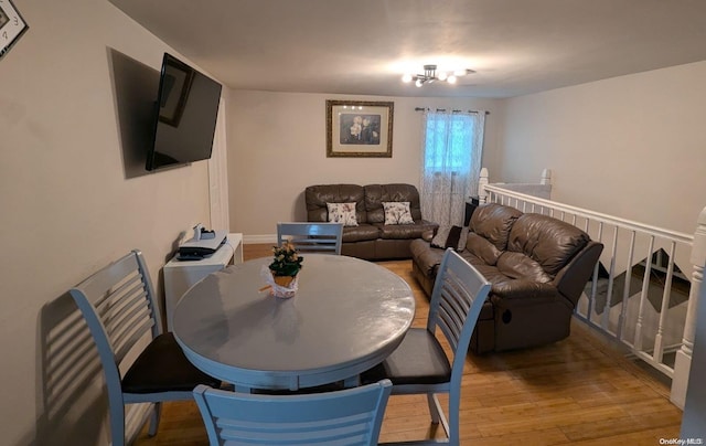 dining space featuring light wood-type flooring