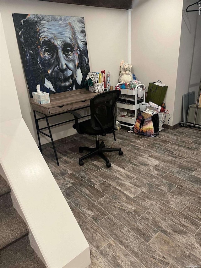 office with dark wood-type flooring