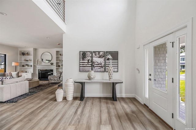 foyer with light hardwood / wood-style flooring