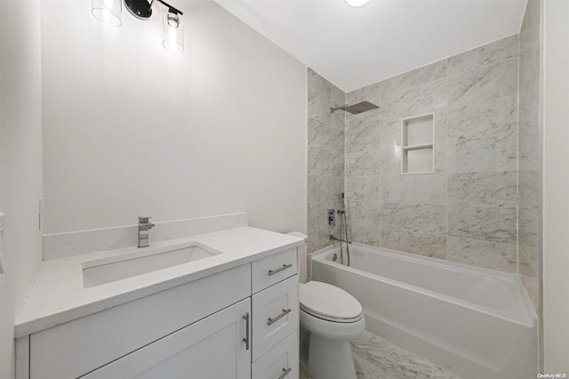 full bathroom featuring vanity, tiled shower / bath combo, and toilet