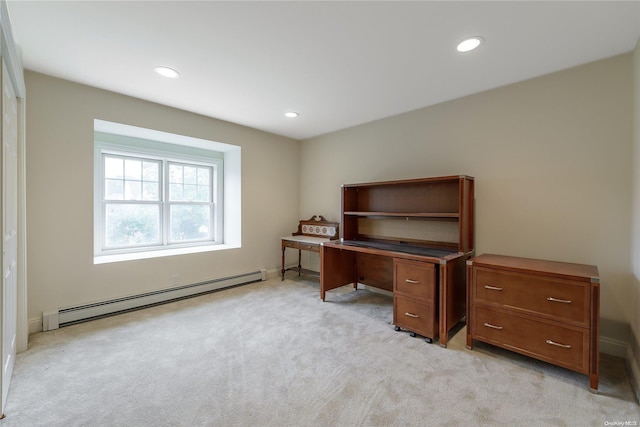 home office with light colored carpet and a baseboard radiator