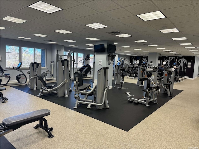 gym featuring a drop ceiling