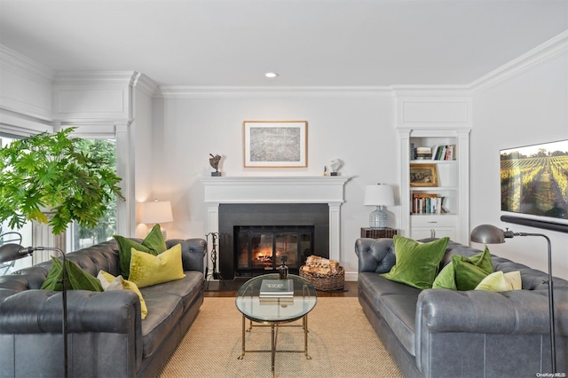 living room featuring ornamental molding and light hardwood / wood-style flooring