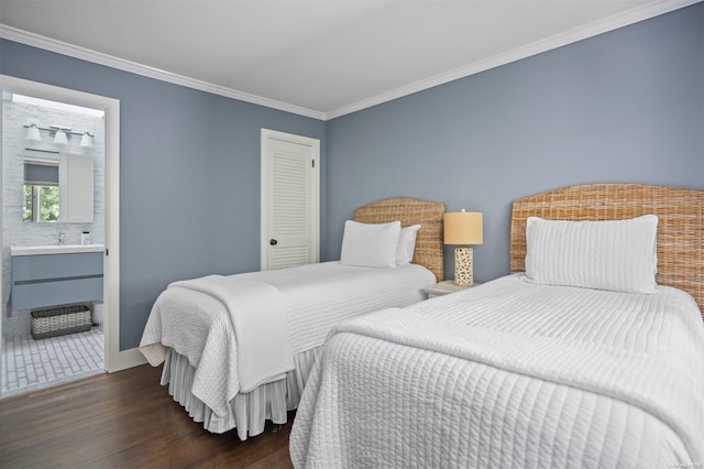 bedroom featuring crown molding, connected bathroom, and dark hardwood / wood-style flooring