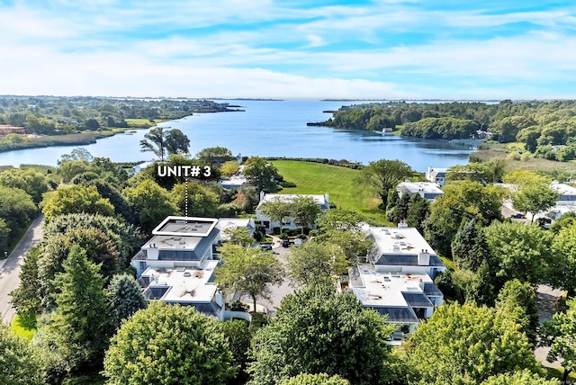 birds eye view of property featuring a water view