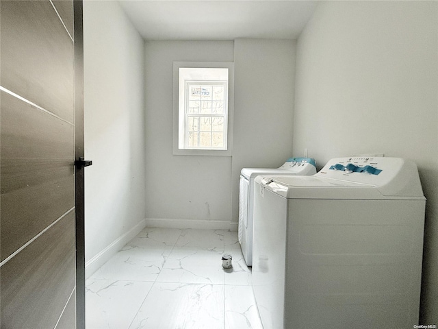 laundry area featuring separate washer and dryer